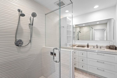 Welcome to this stunning, fully renovated contemporary residence on Bocaire Country Club in Florida - for sale on GolfHomes.com, golf home, golf lot