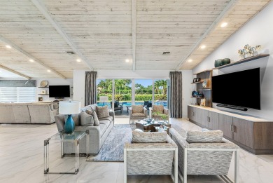 Welcome to this stunning, fully renovated contemporary residence on Bocaire Country Club in Florida - for sale on GolfHomes.com, golf home, golf lot