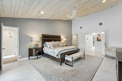Welcome to this stunning, fully renovated contemporary residence on Bocaire Country Club in Florida - for sale on GolfHomes.com, golf home, golf lot