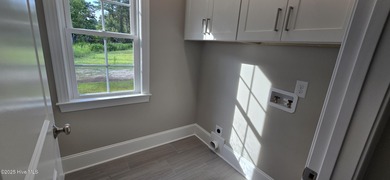 Immaculate new construction by Nelson Adams in popular Country on Ayden Golf and Country Club in North Carolina - for sale on GolfHomes.com, golf home, golf lot