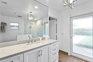 Welcome to this stunning, fully renovated contemporary residence on Bocaire Country Club in Florida - for sale on GolfHomes.com, golf home, golf lot