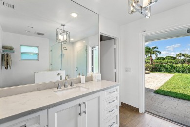 Welcome to this stunning, fully renovated contemporary residence on Bocaire Country Club in Florida - for sale on GolfHomes.com, golf home, golf lot