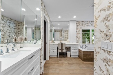 Welcome to this stunning, fully renovated contemporary residence on Bocaire Country Club in Florida - for sale on GolfHomes.com, golf home, golf lot