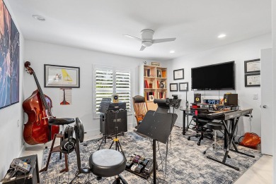 Welcome to this stunning, fully renovated contemporary residence on Bocaire Country Club in Florida - for sale on GolfHomes.com, golf home, golf lot