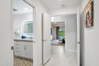 Welcome to this stunning, fully renovated contemporary residence on Bocaire Country Club in Florida - for sale on GolfHomes.com, golf home, golf lot