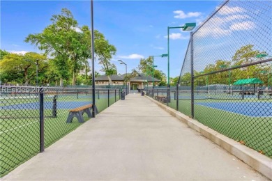Discover easy island living at 569 Queens Grant, a beautifully on Palmetto Dunes Golf Course and Resort in South Carolina - for sale on GolfHomes.com, golf home, golf lot