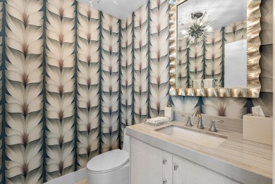 Welcome to this stunning, fully renovated contemporary residence on Bocaire Country Club in Florida - for sale on GolfHomes.com, golf home, golf lot