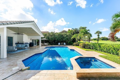 Welcome to this stunning, fully renovated contemporary residence on Bocaire Country Club in Florida - for sale on GolfHomes.com, golf home, golf lot