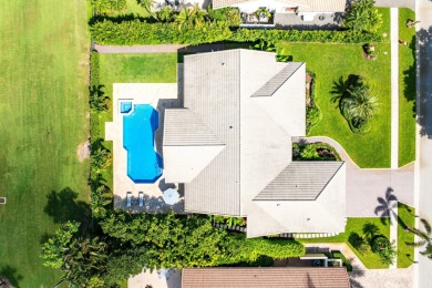 Welcome to this stunning, fully renovated contemporary residence on Bocaire Country Club in Florida - for sale on GolfHomes.com, golf home, golf lot