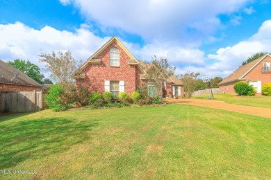 This beautiful 3-bedroom, 2-bathroom split plan home with an on Patrick Farms Golf Club in Mississippi - for sale on GolfHomes.com, golf home, golf lot