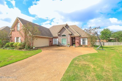 This beautiful 3-bedroom, 2-bathroom split plan home with an on Patrick Farms Golf Club in Mississippi - for sale on GolfHomes.com, golf home, golf lot