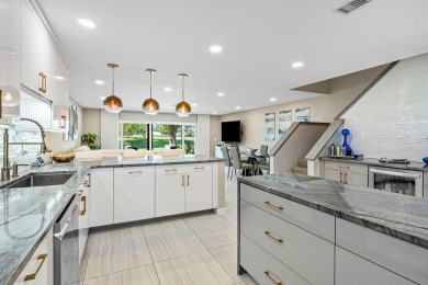 This lavishly remodeled Westgate townhouse boasts two bedrooms on Delray Dunes Golf and Country Club in Florida - for sale on GolfHomes.com, golf home, golf lot