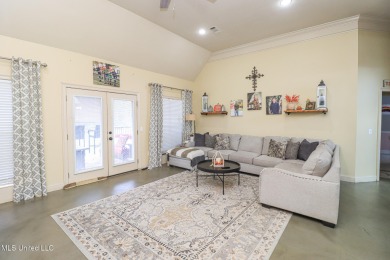 This beautiful 3-bedroom, 2-bathroom split plan home with an on Patrick Farms Golf Club in Mississippi - for sale on GolfHomes.com, golf home, golf lot