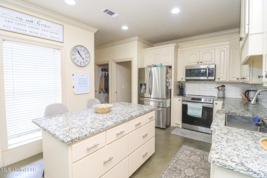 This beautiful 3-bedroom, 2-bathroom split plan home with an on Patrick Farms Golf Club in Mississippi - for sale on GolfHomes.com, golf home, golf lot