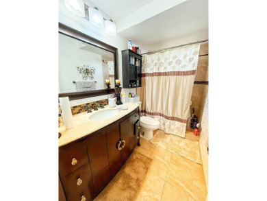 Charming Corner Garden-Style Condo Located on the first floor in on Sunrise Lakes Phase III in Florida - for sale on GolfHomes.com, golf home, golf lot