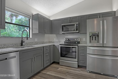 Florida Living at Its Best! Beautifully updated 3 bed/2 bath on New Smyrna Beach Golf Course in Florida - for sale on GolfHomes.com, golf home, golf lot