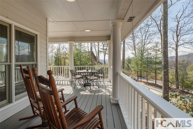 Located in the mountains of Sapphire with a wonderful mountain on Sapphire National Golf Club in North Carolina - for sale on GolfHomes.com, golf home, golf lot