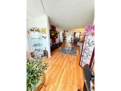 Charming Corner Garden-Style Condo Located on the first floor in on Sunrise Lakes Phase III in Florida - for sale on GolfHomes.com, golf home, golf lot