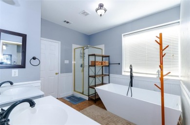 Charming 4-Bedroom Home in Stewart Peninsula. Nestled in the on Stewart Peninsula Golf Course in Texas - for sale on GolfHomes.com, golf home, golf lot