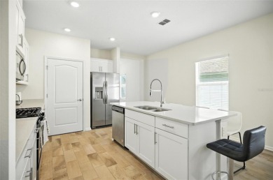Discover the exceptional lifestyle offered by the 55+ Freedom on Grand Reserve Golf Course in Florida - for sale on GolfHomes.com, golf home, golf lot