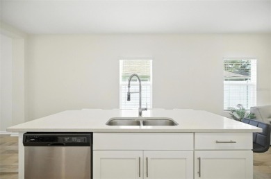Discover the exceptional lifestyle offered by the 55+ Freedom on Grand Reserve Golf Course in Florida - for sale on GolfHomes.com, golf home, golf lot