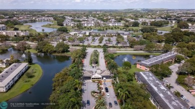 Stunning 2/2 Corner Unit in Wynmoor's Premier 55+ Community on Wynmoor Golf Course in Florida - for sale on GolfHomes.com, golf home, golf lot