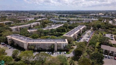 Stunning 2/2 Corner Unit in Wynmoor's Premier 55+ Community on Wynmoor Golf Course in Florida - for sale on GolfHomes.com, golf home, golf lot