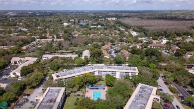 Stunning 2/2 Corner Unit in Wynmoor's Premier 55+ Community on Wynmoor Golf Course in Florida - for sale on GolfHomes.com, golf home, golf lot