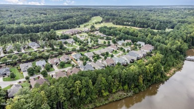 Welcome home to unparalleled luxury and convenience in your on Hasentree Club in North Carolina - for sale on GolfHomes.com, golf home, golf lot