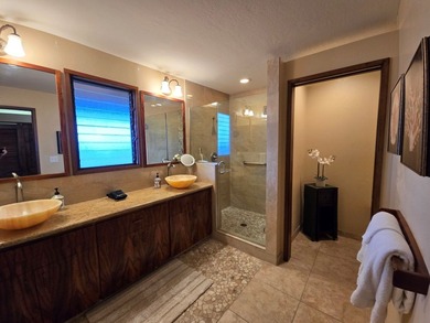 This spacious and beautifully upgraded 2-bedroom, 2-bathroom on Kona Country Club Golf Course in Hawaii - for sale on GolfHomes.com, golf home, golf lot