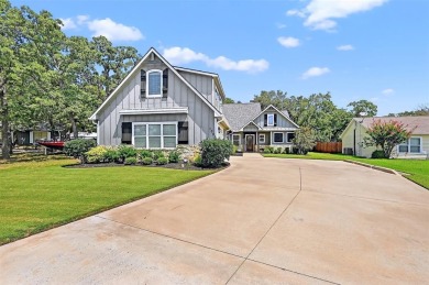 This Lake Kiowa home was designed for comfort AND style! The on Lake Kiowa Golf Course in Texas - for sale on GolfHomes.com, golf home, golf lot