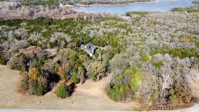 Discover the perfect setting for your dream home on this on Rock Creek Golf Club in Texas - for sale on GolfHomes.com, golf home, golf lot