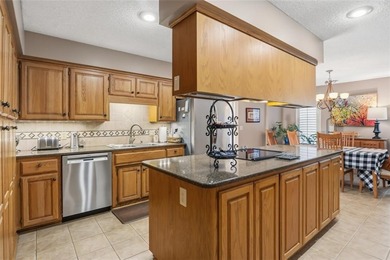 Nestled along the lush greens of the Paradise Valley Golf Course on Paradise Valley Athletic Club in Arkansas - for sale on GolfHomes.com, golf home, golf lot