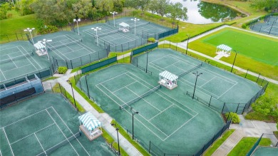 $60K in Upgrades! Partially Furnished MOVE IN READY VILLA - Just on University Park Country Club in Florida - for sale on GolfHomes.com, golf home, golf lot