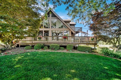 Wake up to sweeping fairway views and end your day poolside at on Briar Leaf Golf Club in Indiana - for sale on GolfHomes.com, golf home, golf lot