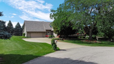 Wake up to sweeping fairway views and end your day poolside at on Briar Leaf Golf Club in Indiana - for sale on GolfHomes.com, golf home, golf lot