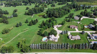 Wake up to sweeping fairway views and end your day poolside at on Briar Leaf Golf Club in Indiana - for sale on GolfHomes.com, golf home, golf lot