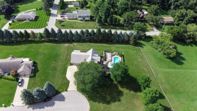 Wake up to sweeping fairway views and end your day poolside at on Briar Leaf Golf Club in Indiana - for sale on GolfHomes.com, golf home, golf lot