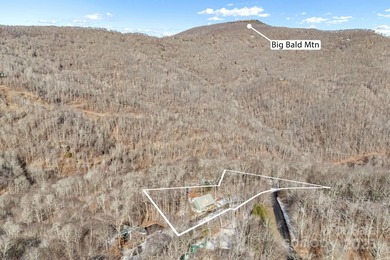 Enjoy a direct view of Big Bald Mountain from this spotless on Wolf Laurel Country Club in North Carolina - for sale on GolfHomes.com, golf home, golf lot