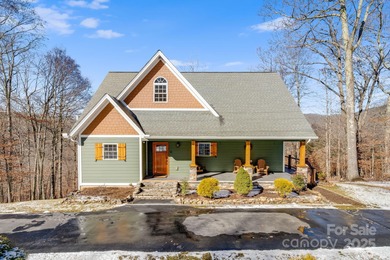 Enjoy a direct view of Big Bald Mountain from this spotless on Wolf Laurel Country Club in North Carolina - for sale on GolfHomes.com, golf home, golf lot