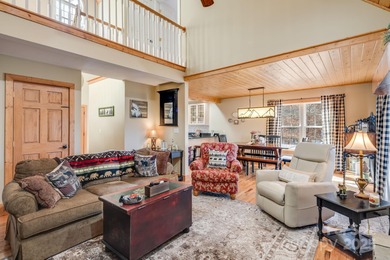 Enjoy a direct view of Big Bald Mountain from this spotless on Wolf Laurel Country Club in North Carolina - for sale on GolfHomes.com, golf home, golf lot