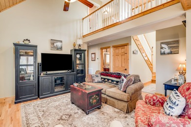 Enjoy a direct view of Big Bald Mountain from this spotless on Wolf Laurel Country Club in North Carolina - for sale on GolfHomes.com, golf home, golf lot