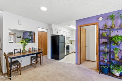 This charming condo offers the ideal blend of comfort on Continental Country Club in Arizona - for sale on GolfHomes.com, golf home, golf lot