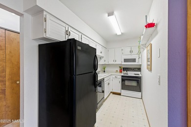 This charming condo offers the ideal blend of comfort on Continental Country Club in Arizona - for sale on GolfHomes.com, golf home, golf lot