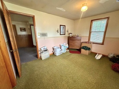 Welcome to 202 S. Maple St! This cozy 3 bedroom, 1 bath home on The Links at Pretty Prairie in Kansas - for sale on GolfHomes.com, golf home, golf lot