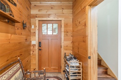 Step inside and feel the warmth of this beautifully crafted on Sapphire National Golf Club in North Carolina - for sale on GolfHomes.com, golf home, golf lot