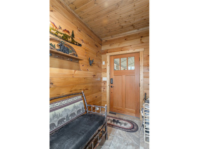 Step inside and feel the warmth of this beautifully crafted on Sapphire National Golf Club in North Carolina - for sale on GolfHomes.com, golf home, golf lot