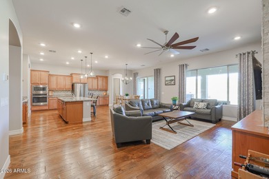 This exceptional energy-efficient 4-bedroom, 3.5-bath home with on Estrella Mountain Ranch Golf Course in Arizona - for sale on GolfHomes.com, golf home, golf lot