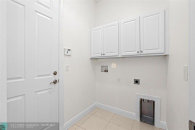 Why wait to build when you can move into this immaculate Bella on PGA Golf Club in PGA Village in Florida - for sale on GolfHomes.com, golf home, golf lot