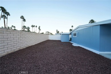 Step into this sun-filled 2 bedroom, 2 bath retreat where modern on Date Palm Country Club in California - for sale on GolfHomes.com, golf home, golf lot